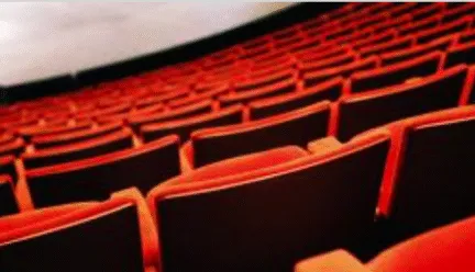 image of red seats in theatre